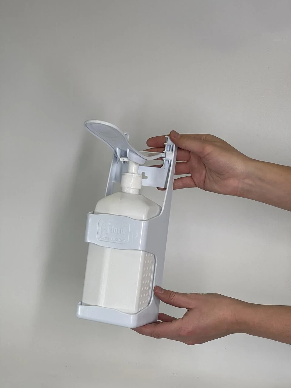 Elbow dispenser dispenser for antiseptic for wall mounting 1 liter from plastic DADB 100