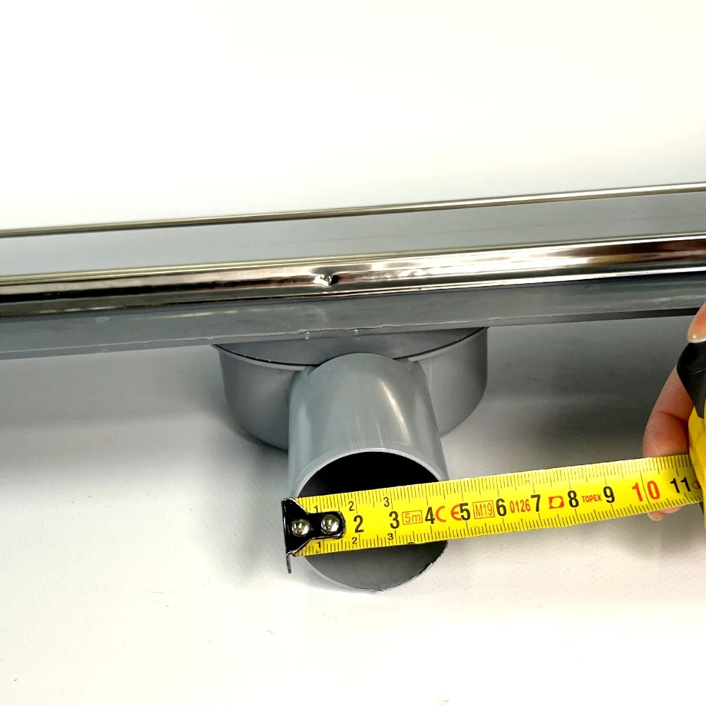 Shower drain with 360 swivel siphon, “UNDER TILE” grate 60 cm, stainless steel edge Shower drain with 360 swivel siphon, “UNDER TILE” grate 60 cm, stainless steel edge