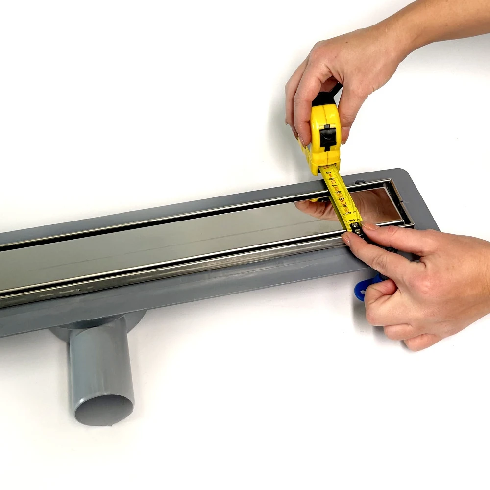 Shower drain with 360 swivel siphon, “UNDER TILE” grate 60 cm, stainless steel edge Shower drain with 360 swivel siphon, “UNDER TILE” grate 60 cm, stainless steel edge