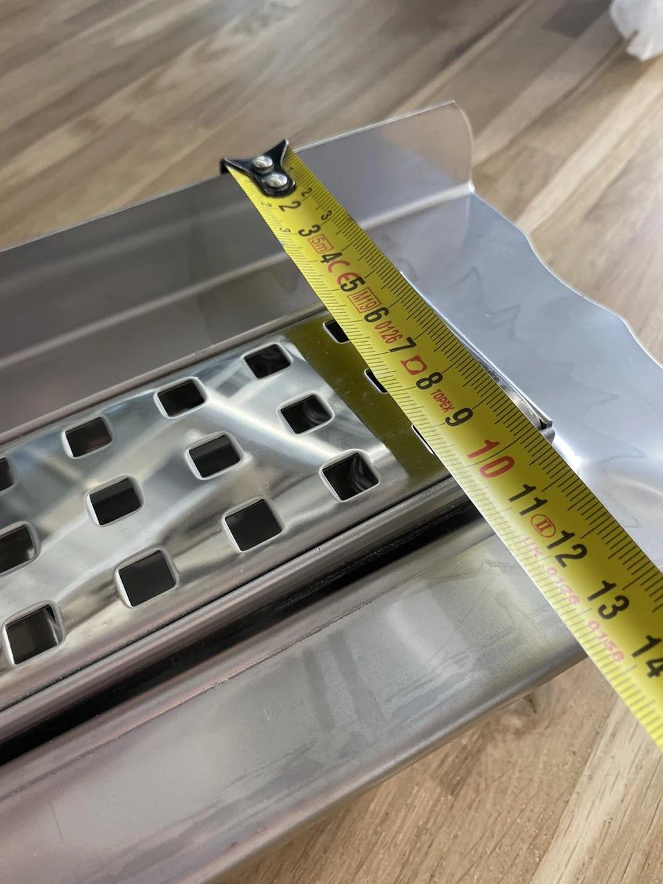 Shower drain with a stainless steel body with a horizontal flange, “Square” grate 80 cm. Shower drain with a stainless steel body with a horizontal flange, “Square” grate 80 cm.