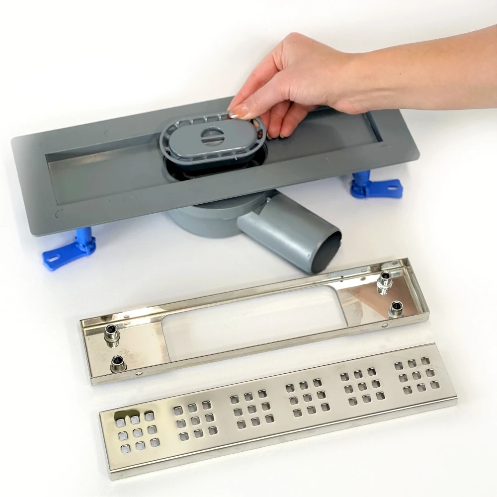 Shower drain with horizontal outlet, 33 cm square grate with horizontal flange Shower drain with horizontal outlet, 33 cm square grate with horizontal flange
