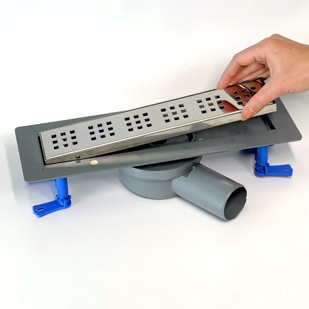 Shower drain with horizontal outlet, 33 cm square grate with horizontal flange Shower drain with horizontal outlet, 33 cm square grate with horizontal flange