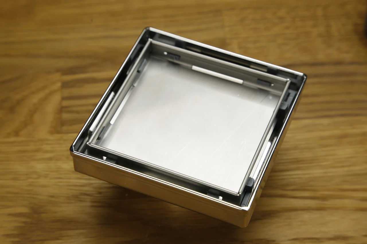 Stainless steel drain DN50 with tile grate, vertical outlet 15x15, Shower drain with dry seal Stainless steel drain DN50 with tile grate, vertical outlet 15x15, Shower drain with dry seal