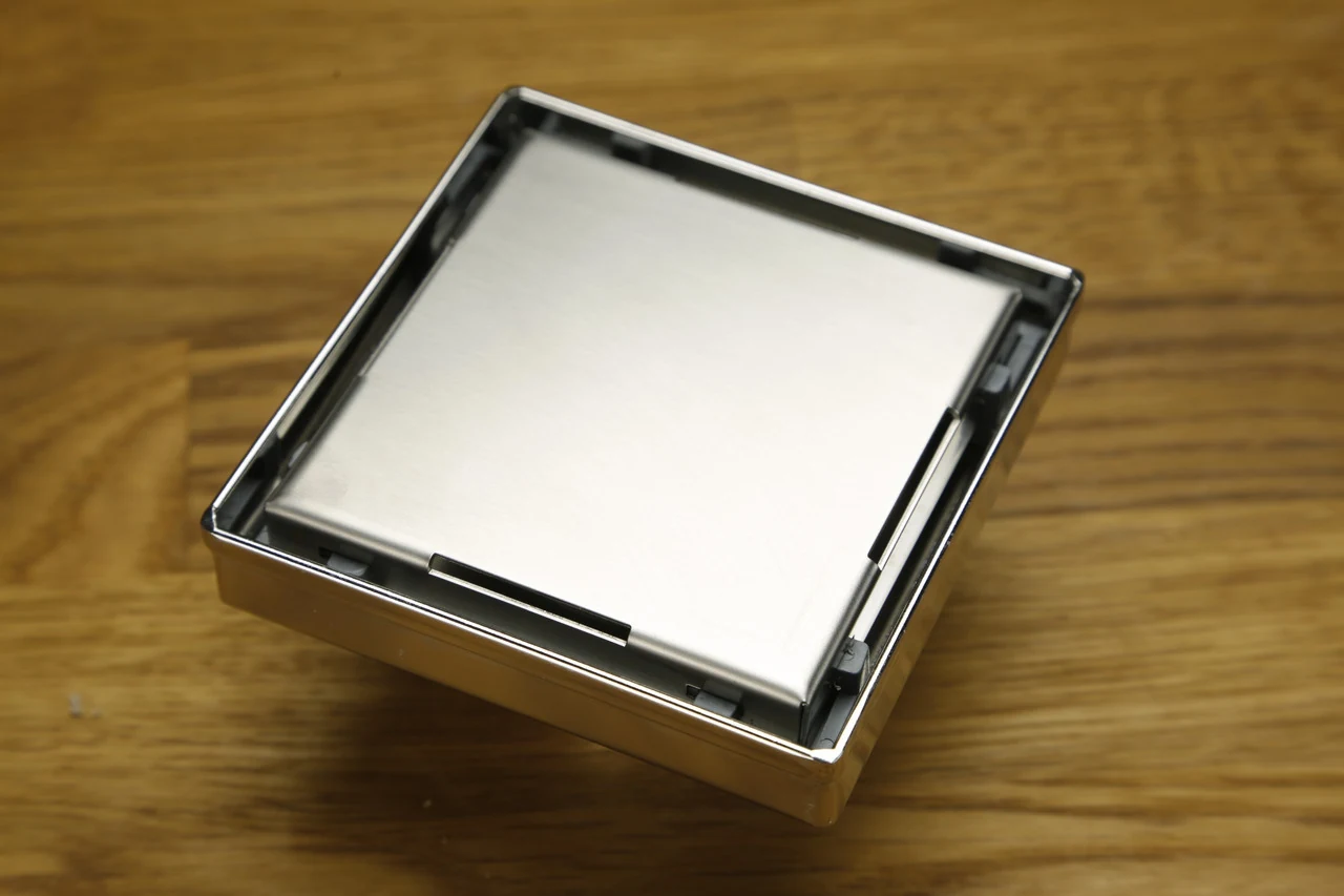 Stainless steel drain DN50 with tile grate, vertical outlet 15x15, Shower drain with dry seal