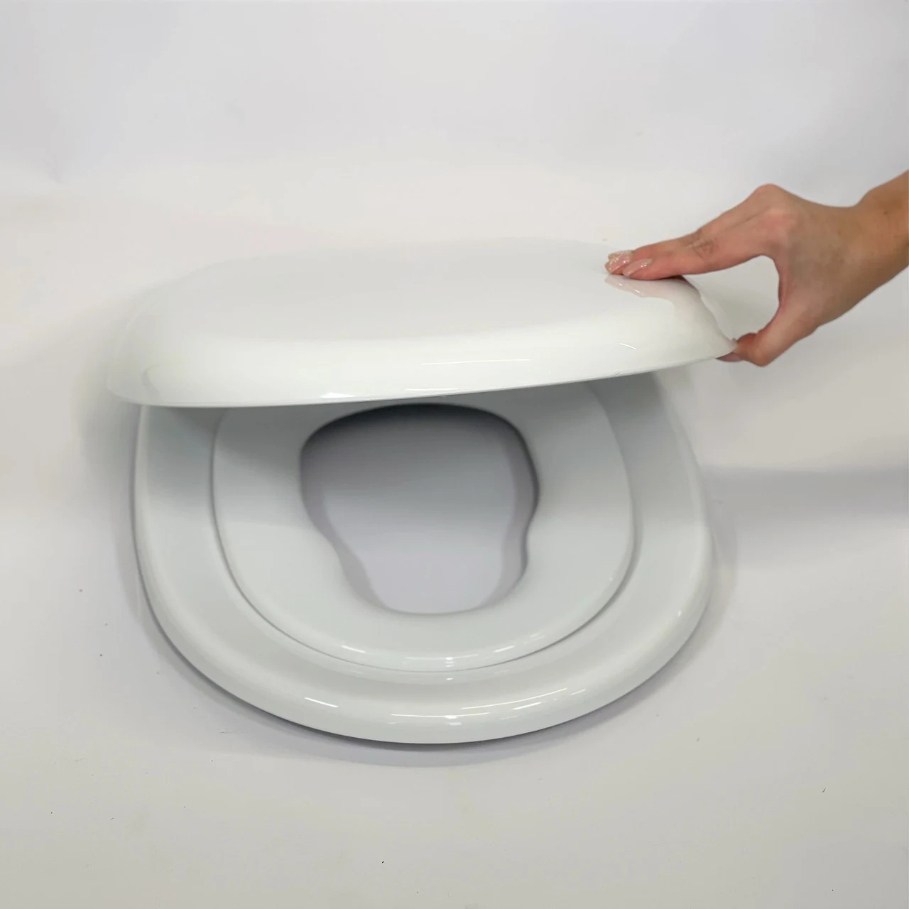 Toilet lid with child seat on magnet Family 0348, Toilet seat with micro-lift function Toilet lid with child seat on magnet Family 0348, Toilet seat with micro-lift function